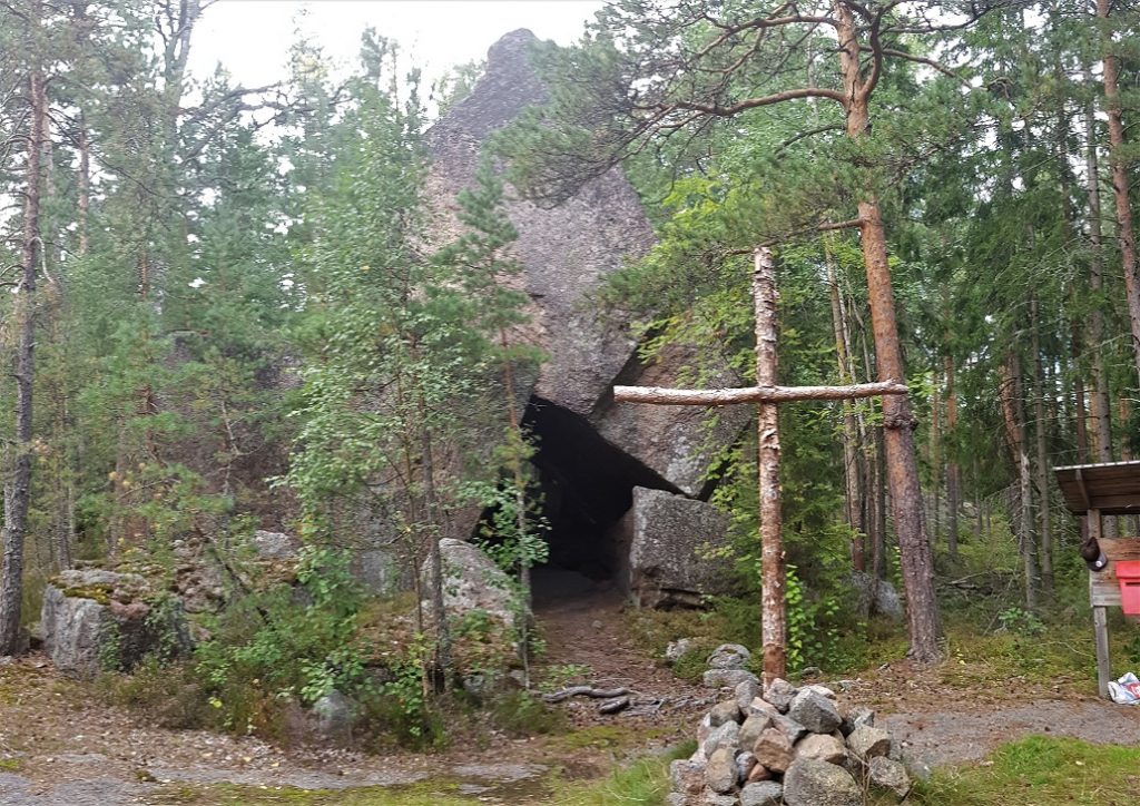 Korsvik rock church and wooden cross